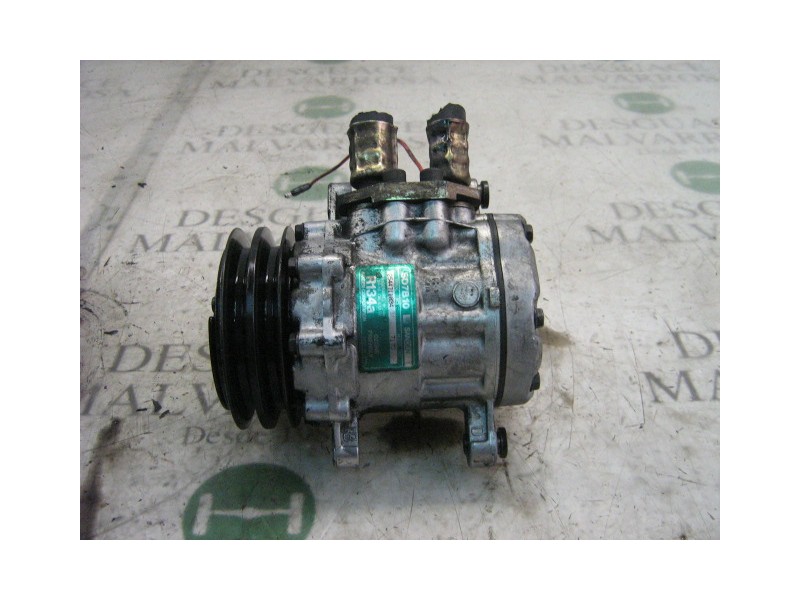Recambio de compresor aire acondicionado para nissan trade 100 referencia OEM IAM   