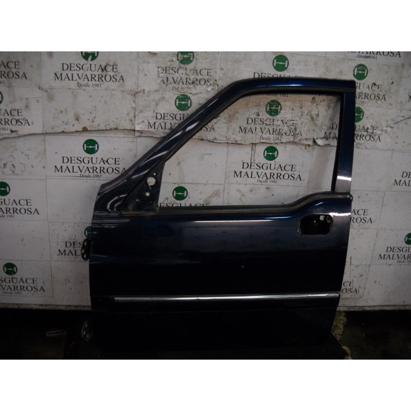 Recambio de puerta delantera izquierda para ssangyong musso 2.9 tdi grand lux referencia OEM IAM   