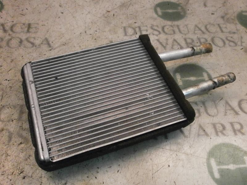 Recambio de radiador calefaccion / aire acondicionado para kia carnival td ls travel referencia OEM IAM 0K55261H01  