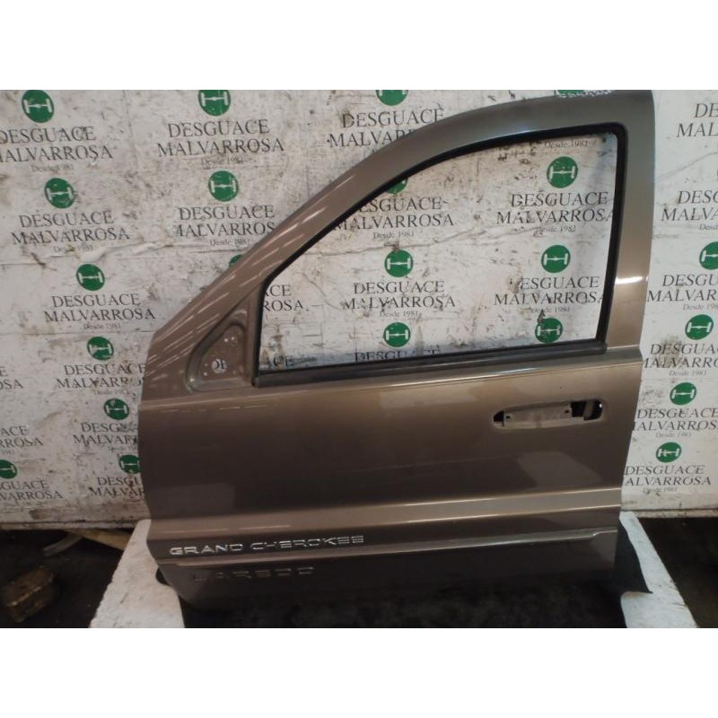 Recambio de puerta delantera izquierda para jeep gr.cherokee (wj/wg) 3.1 td laredo referencia OEM IAM   