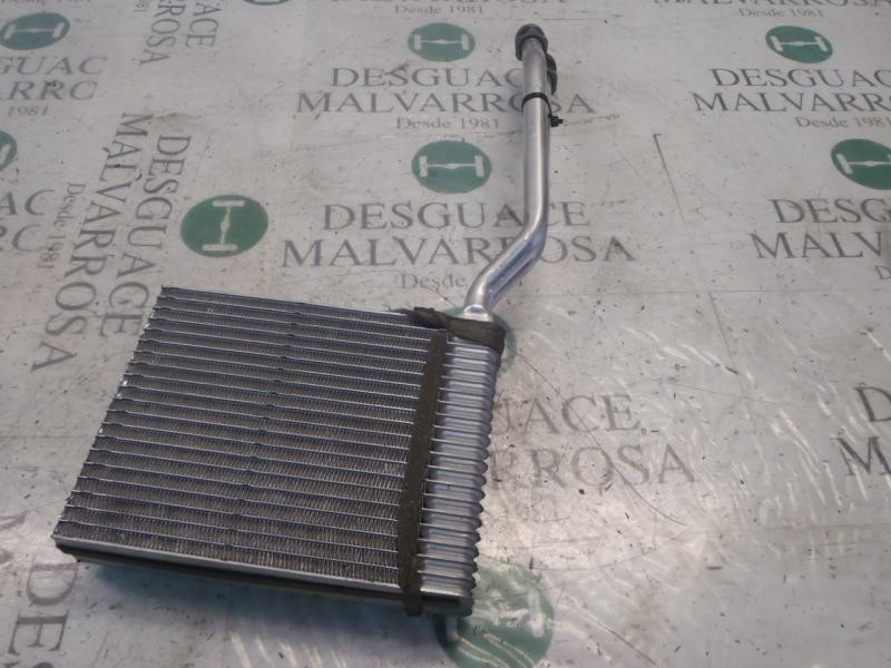 Recambio de radiador calefaccion / aire acondicionado para ford focus turnier (cb4) trend referencia OEM IAM 1754199  