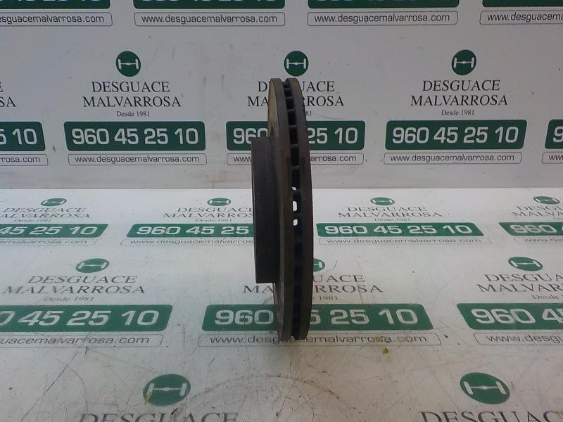 Recambio de disco freno delantero para ford fiesta (cb1) 1.6 tdci cat referencia OEM IAM 1679853  