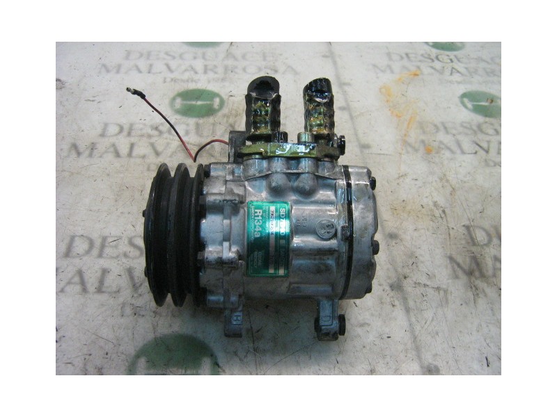 Recambio de compresor aire acondicionado para nissan trade 100 referencia OEM IAM   