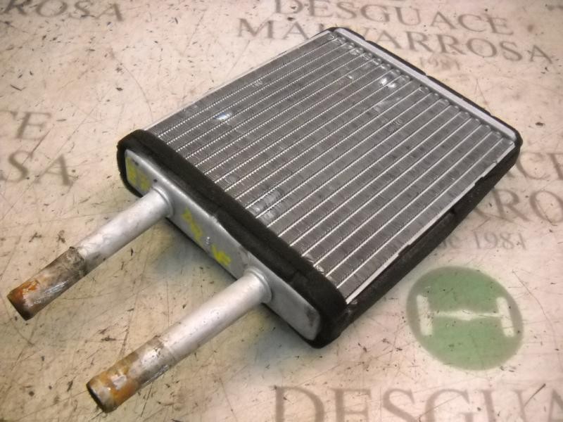 Recambio de radiador calefaccion / aire acondicionado para kia carnival td ls referencia OEM IAM 0K55261H01  