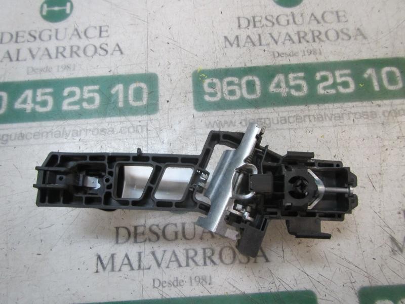 Recambio de maneta exterior trasera izquierda para ford fiesta (ccn) titanium referencia OEM IAM 1788863  