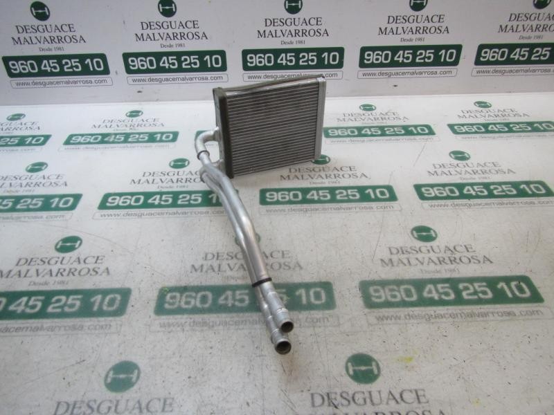Recambio de radiador calefaccion / aire acondicionado para ford fiesta (ccn) titanium referencia OEM IAM 1743436  