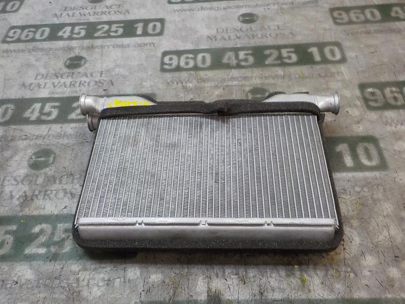 Recambio de radiador calefaccion / aire acondicionado para bmw serie 5 touring (f11) 520d referencia OEM IAM 64119163330  