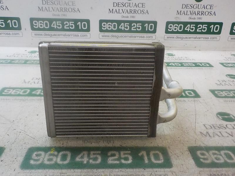 Recambio de radiador calefaccion / aire acondicionado para ford fiesta (ccn) trend referencia OEM IAM 1743436  