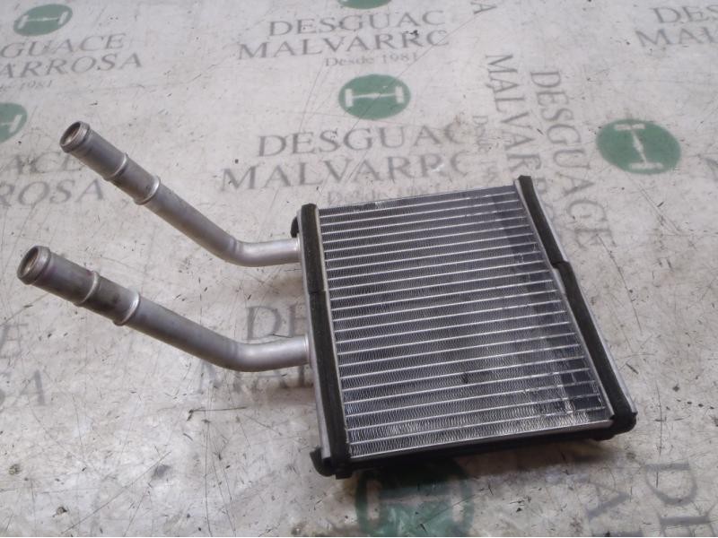 Recambio de radiador calefaccion / aire acondicionado para ssangyong kyron 200 xdi limited referencia OEM IAM 6913009100  