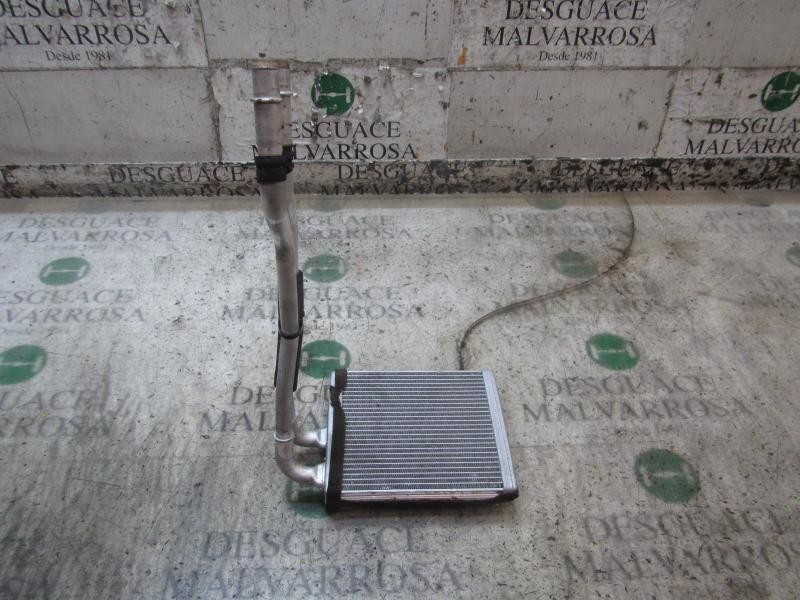 Recambio de radiador calefaccion / aire acondicionado para ford fiesta (cb1) titanium referencia OEM IAM 1743436  